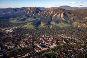 Aerial view of Boulder, Colorado showing the Flatirons and the CU Boulder campus